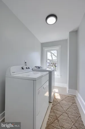 a bathroom with a sink a vanity and a mirror