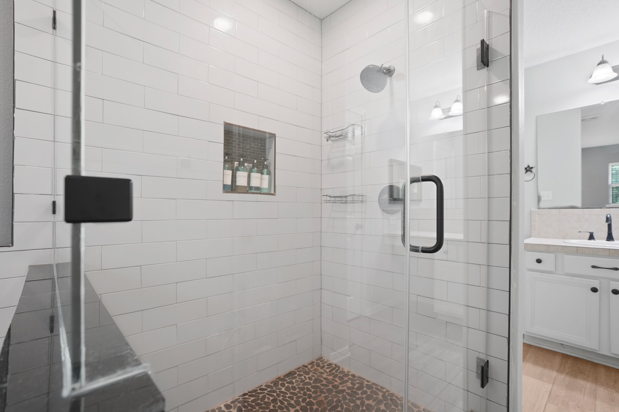 1003 Cherry Creek Road Dayton, TX 77535 - Photo 25 of 45 Large walk-in shower with pebble stone flooring.