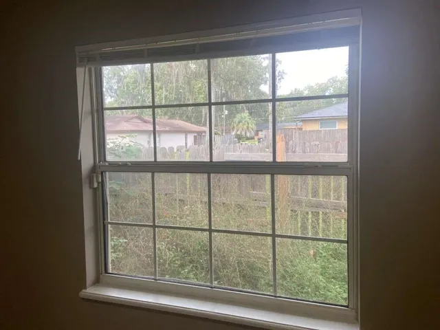 a view of a room and window