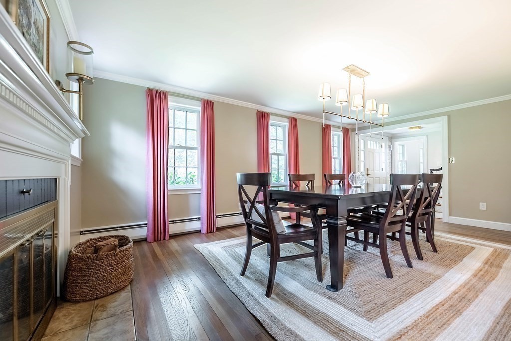 237 Highland Road Andover, MA 01810 - Photo 15 of 42 a view of a dining room with furniture window and wooden floor