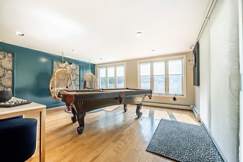 237 Highland Road Andover, MA 01810 - Photo 31 of 42 a living room with furniture a piano and a table