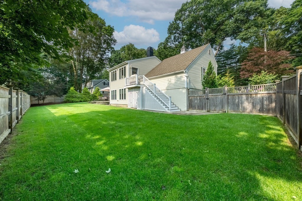237 Highland Road Andover, MA 01810 - Photo 40 of 42 a view of a house with a yard and sitting area