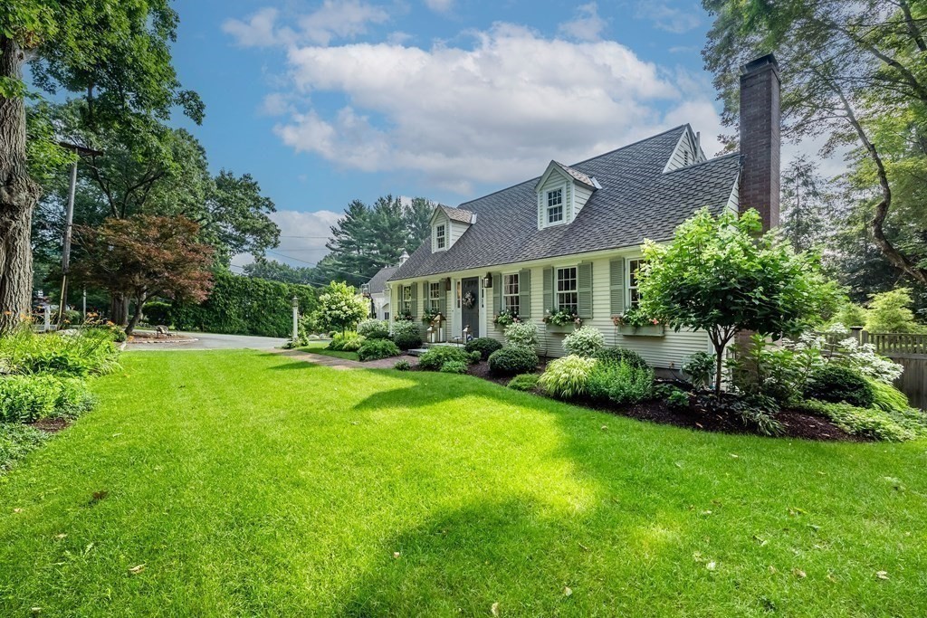 237 Highland Road Andover, MA 01810 - Photo 42 of 42 a front view of a house with garden