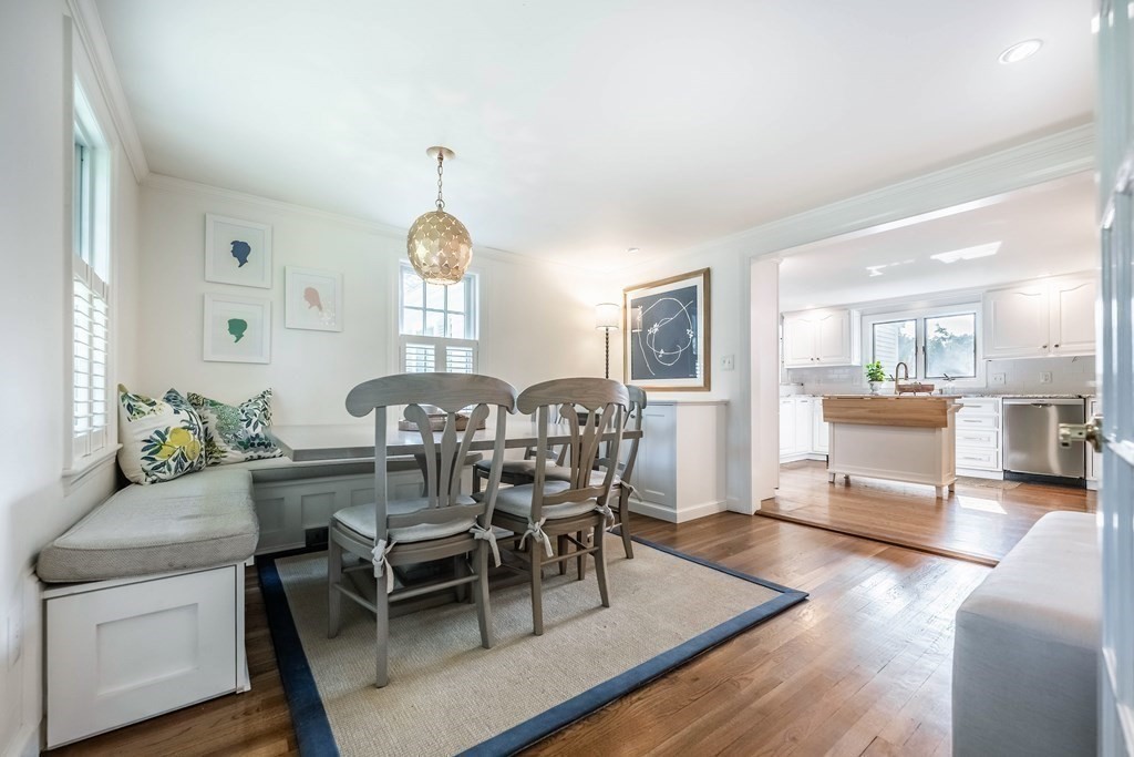 237 Highland Road Andover, MA 01810 - Photo 7 of 42 a view of a dining room with furniture window and wooden floor