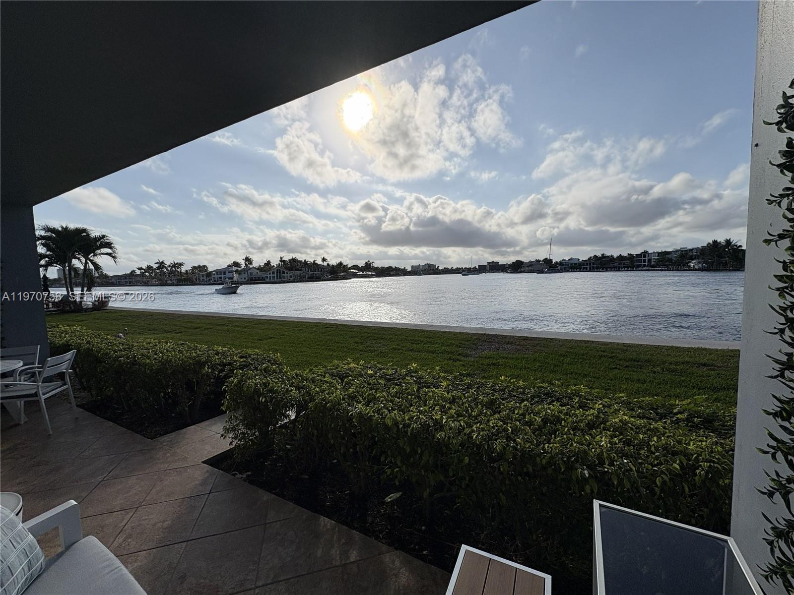 1201 South Riverside Drive, Unit 107 Pompano Beach, FL 33062 - Photo 2 of 27 a view of a lake from a balcony