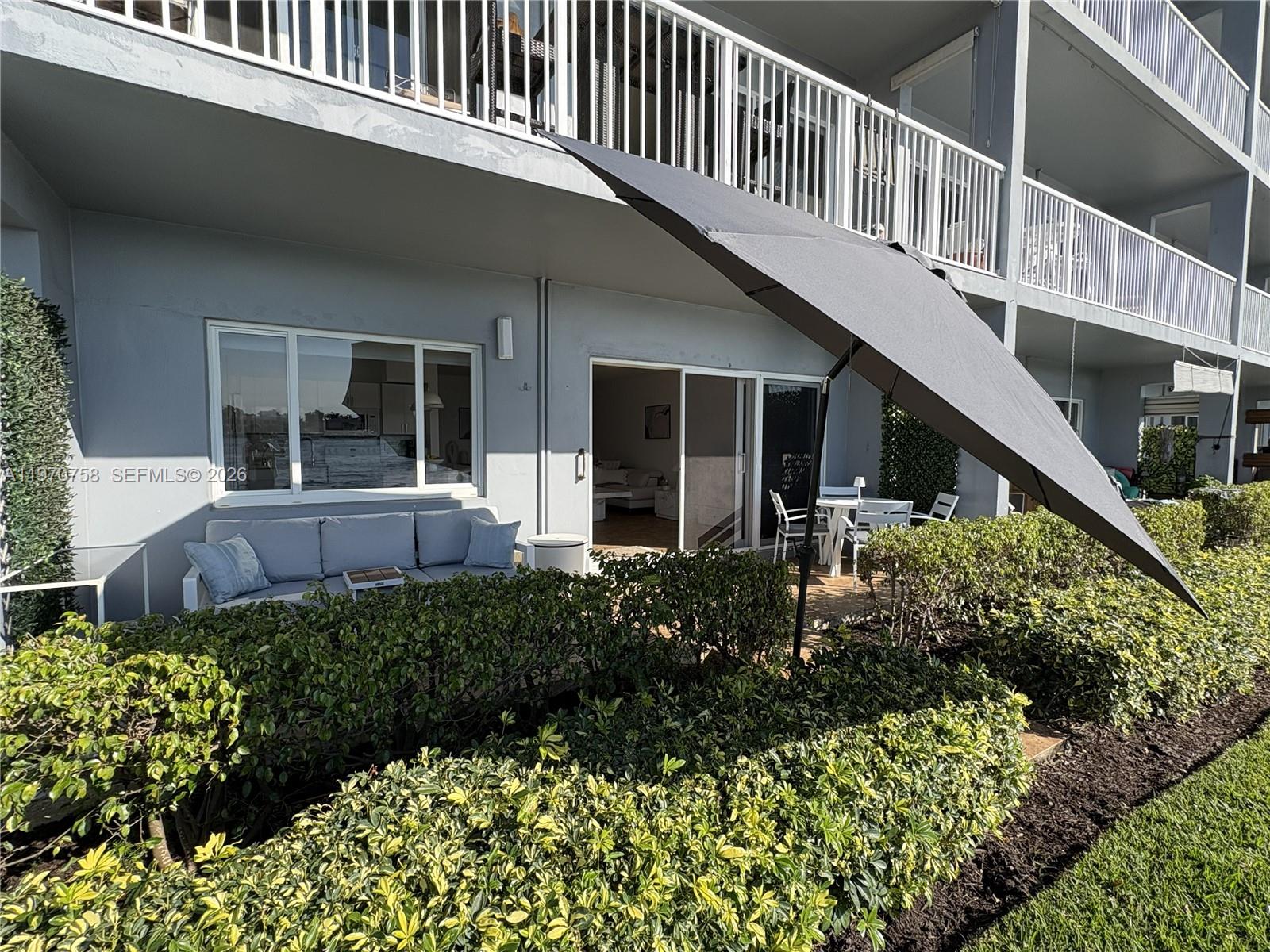 1201 South Riverside Drive, Unit 107 Pompano Beach, FL 33062 - Photo 21 of 27 front view of a house with a large window