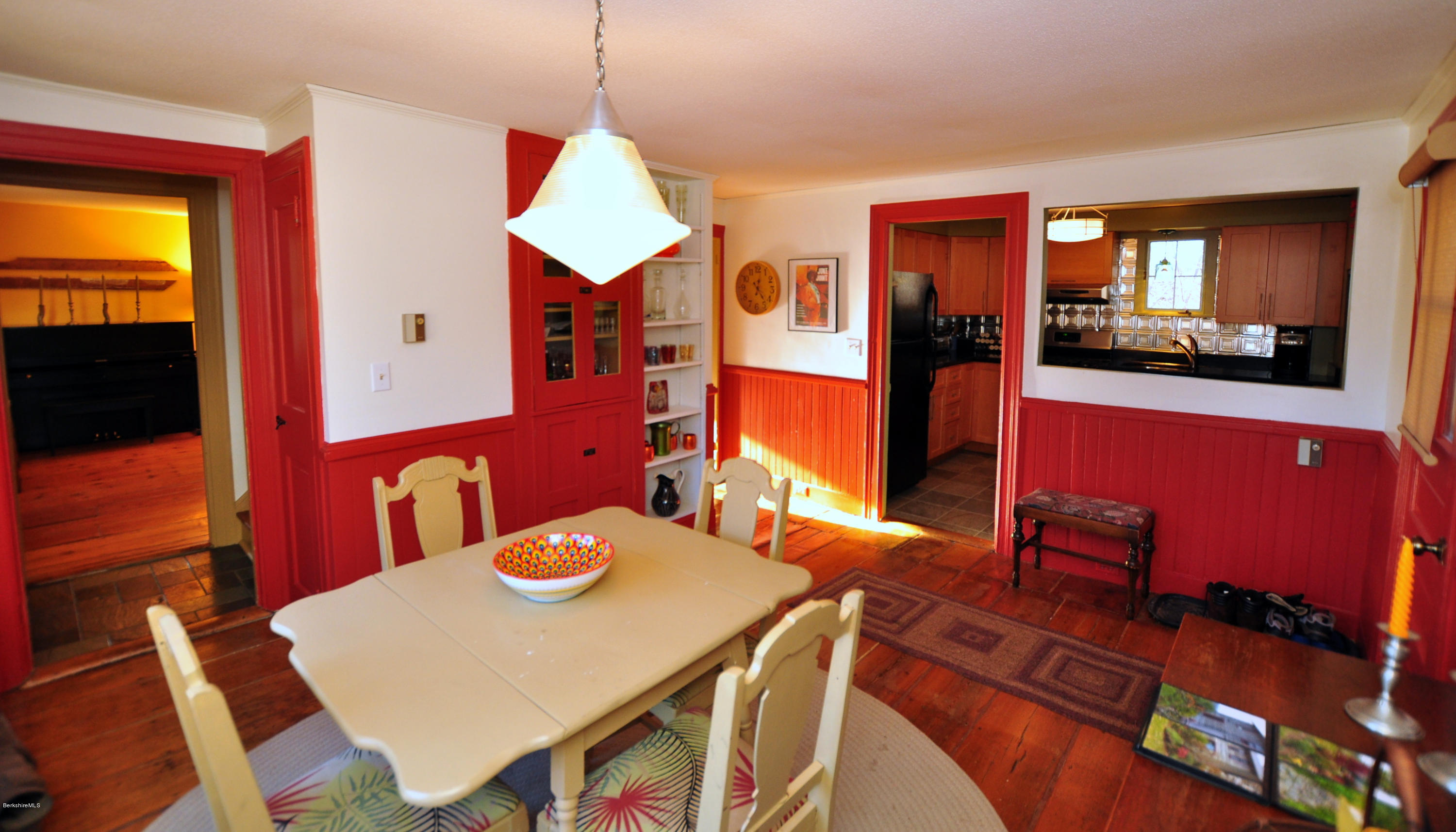 151 Main Road Tyringham, MA 01264 - Photo 8 of 62 a view of a dining room with furniture