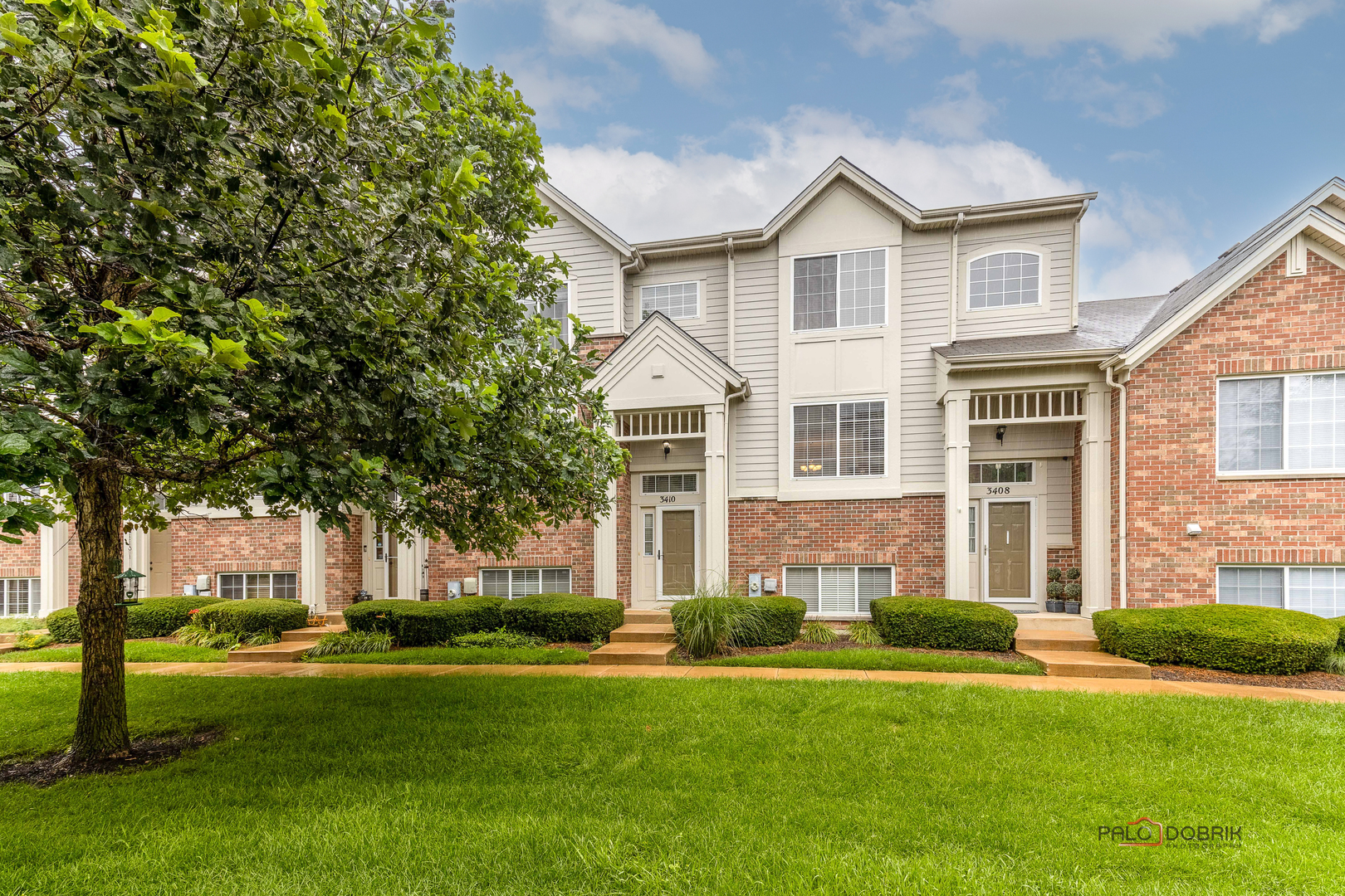 3410 Cameron Drive Elgin, IL 60124 - Photo 1 of 28 a front view of a house with a yard
