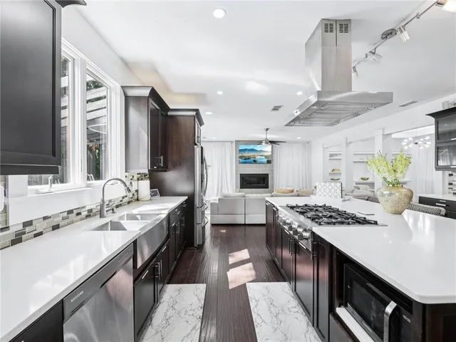 a view of a dining room with furniture and window