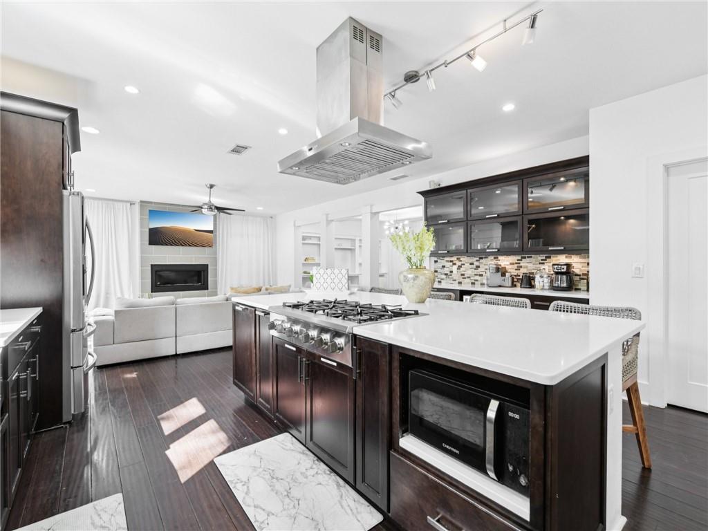 1399 North Druid Hills Road Northeast Atlanta, GA 30319 - Photo 15 of 58 a kitchen with stainless steel appliances granite countertop a stove and a refrigerator