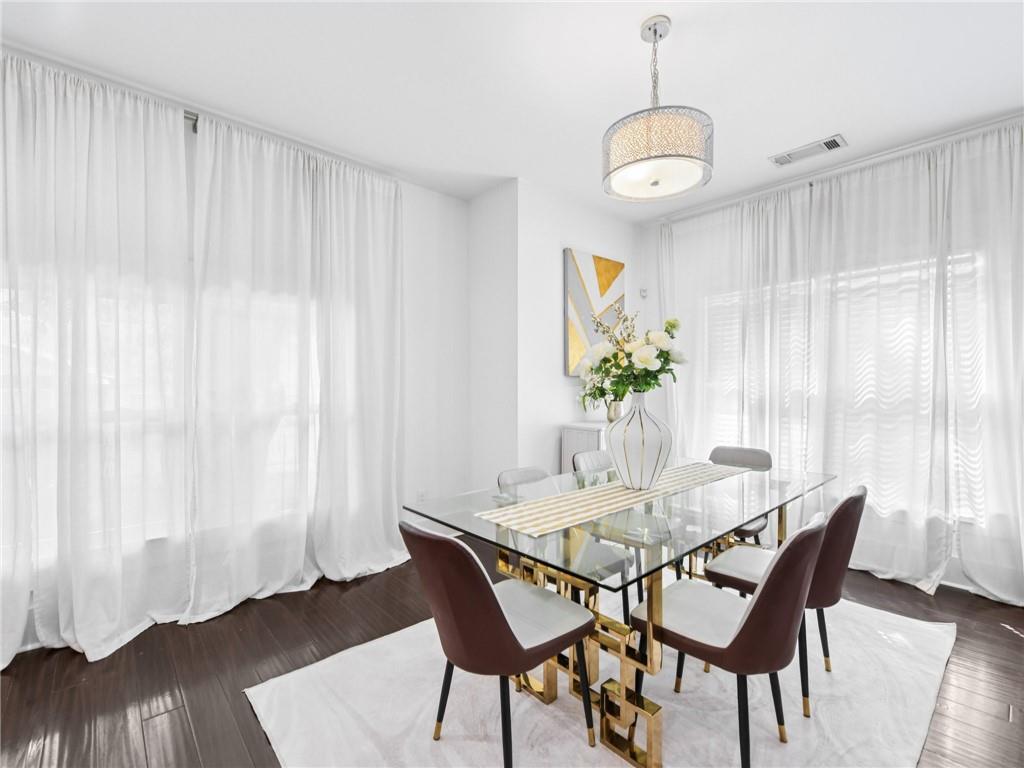 1399 North Druid Hills Road Northeast Atlanta, GA 30319 - Photo 17 of 58 a view of a dining room with furniture and window