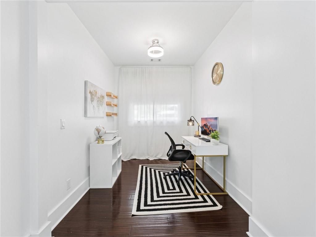 1399 North Druid Hills Road Northeast Atlanta, GA 30319 - Photo 21 of 58 a view of livingroom with furniture and wooden floor