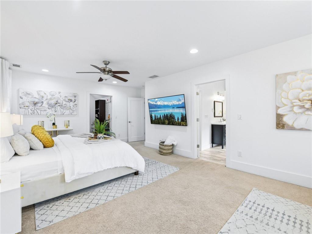 1399 North Druid Hills Road Northeast Atlanta, GA 30319 - Photo 27 of 58 a bedroom with a bed couch and window