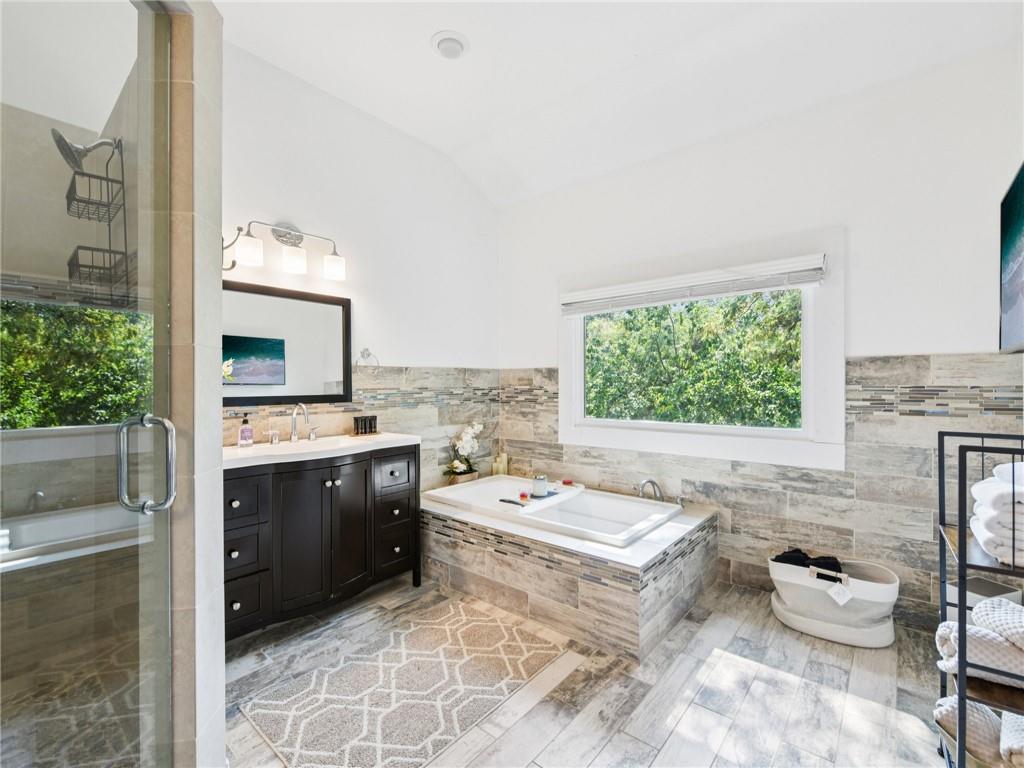 1399 North Druid Hills Road Northeast Atlanta, GA 30319 - Photo 28 of 58 a living room with stainless steel appliances kitchen island granite countertop a sink and a stove