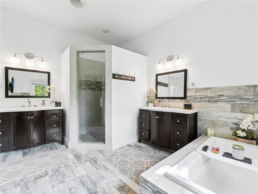 1399 North Druid Hills Road Northeast Atlanta, GA 30319 - Photo 29 of 58 a bedroom with a bed and a dresser