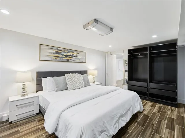 a view of a chair and table in backyard