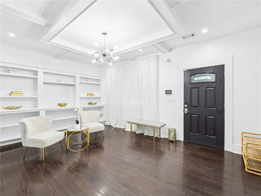 1399 North Druid Hills Road Northeast Atlanta, GA 30319 - Photo 5 of 58 a view of a dining room with furniture and wooden floor