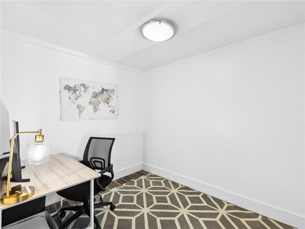 1399 North Druid Hills Road Northeast Atlanta, GA 30319 - Photo 51 of 58 a view of a workspace with furniture and a window