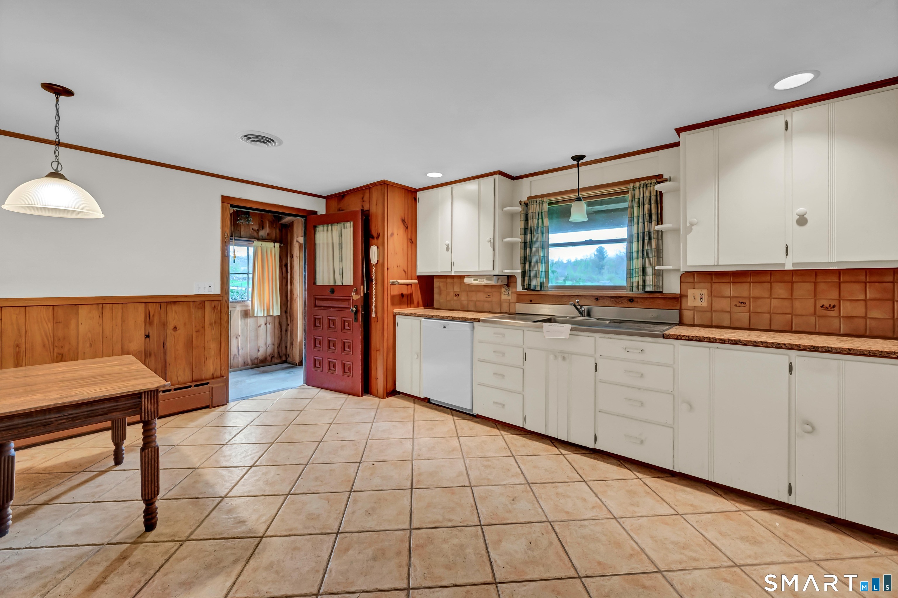 139 West Side Road Goshen, CT 06756 - Photo 5 of 17 a kitchen with stainless steel appliances granite countertop a sink and a refrigerator