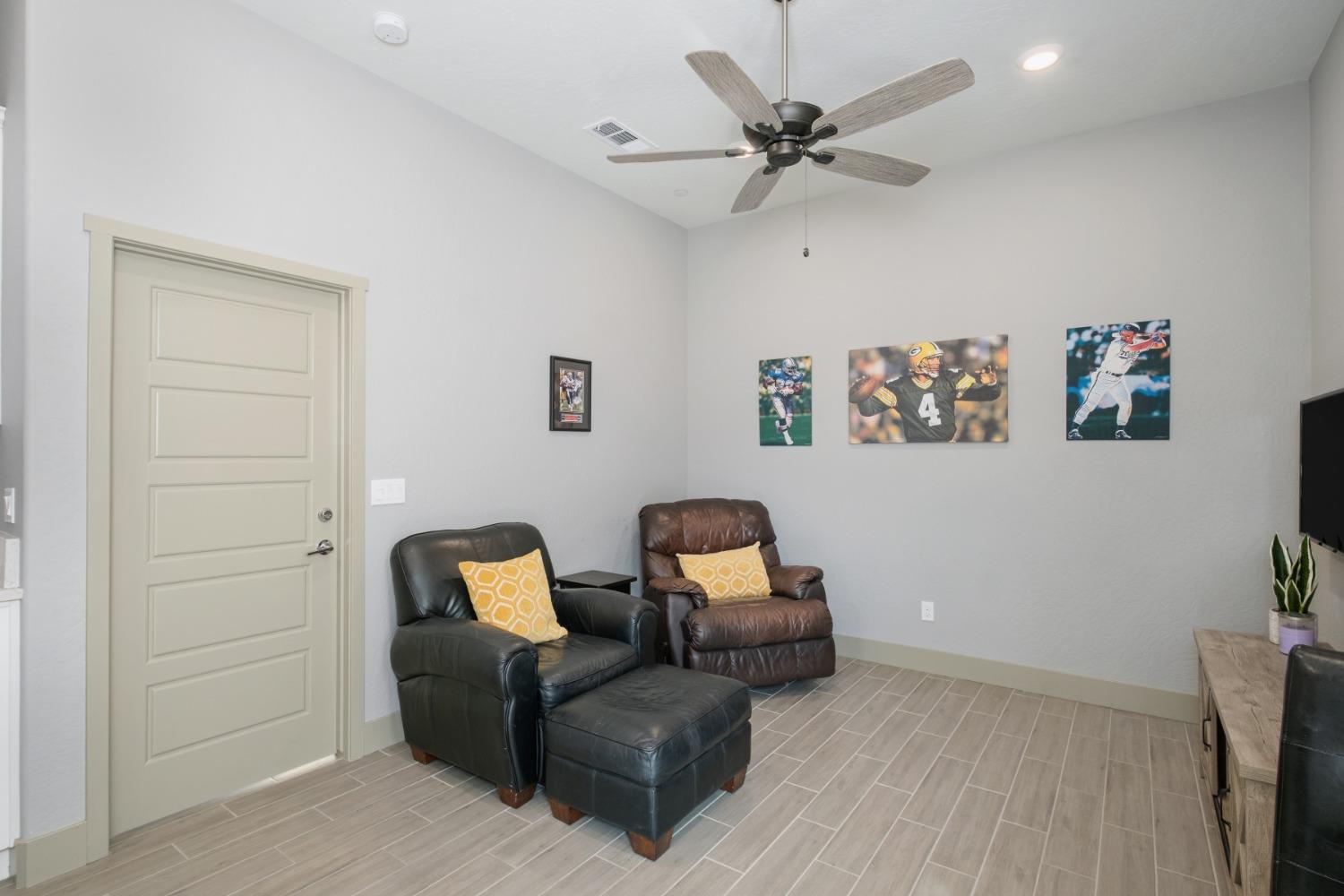 859 Maclure Avenue Madera, CA 93636 - Photo 35 of 53 a living room with furniture and a ceiling fan