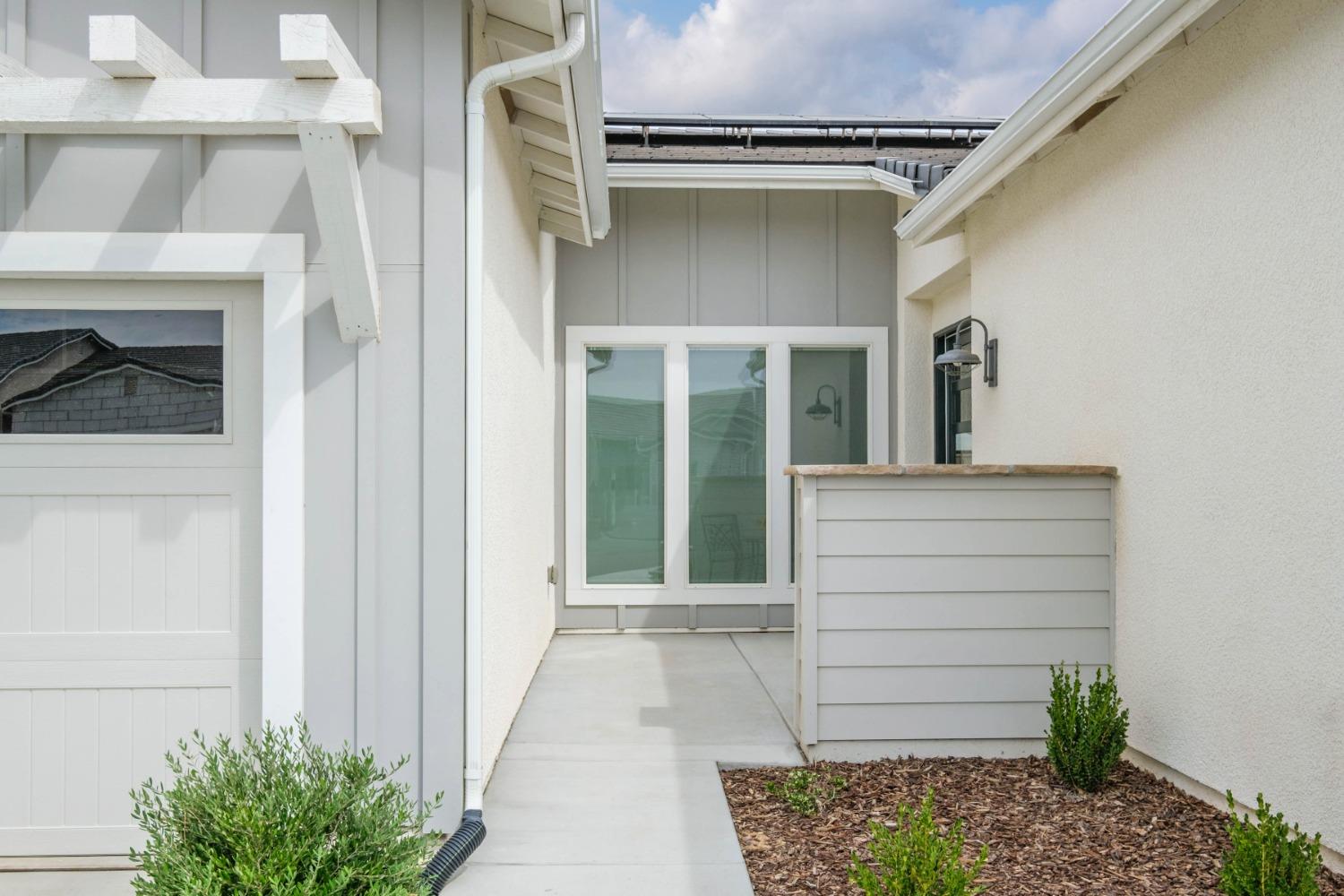 859 Maclure Avenue Madera, CA 93636 - Photo 4 of 53 a view of front door and porch