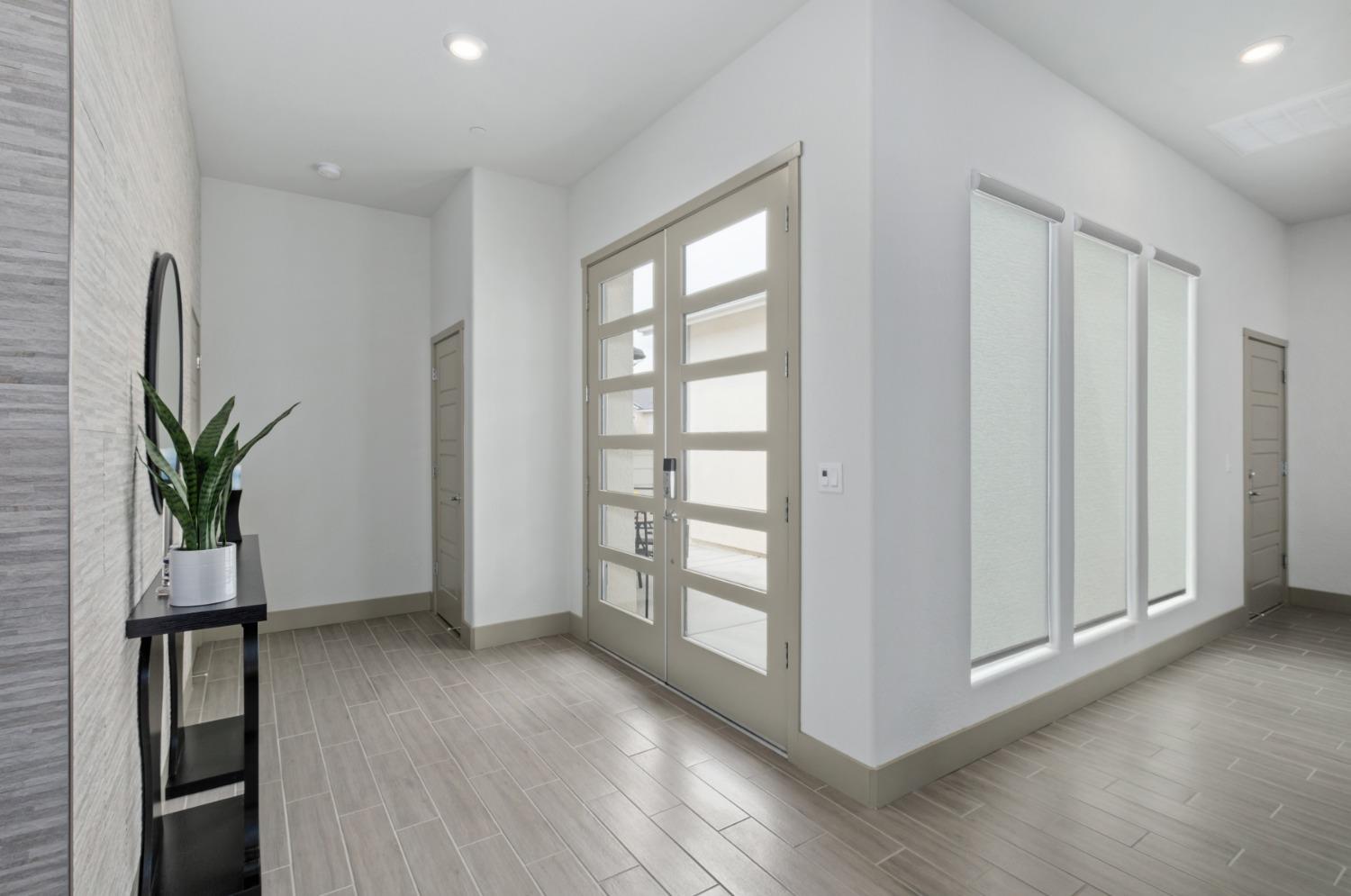 859 Maclure Avenue Madera, CA 93636 - Photo 7 of 53 a view of a room with wooden floor and closet