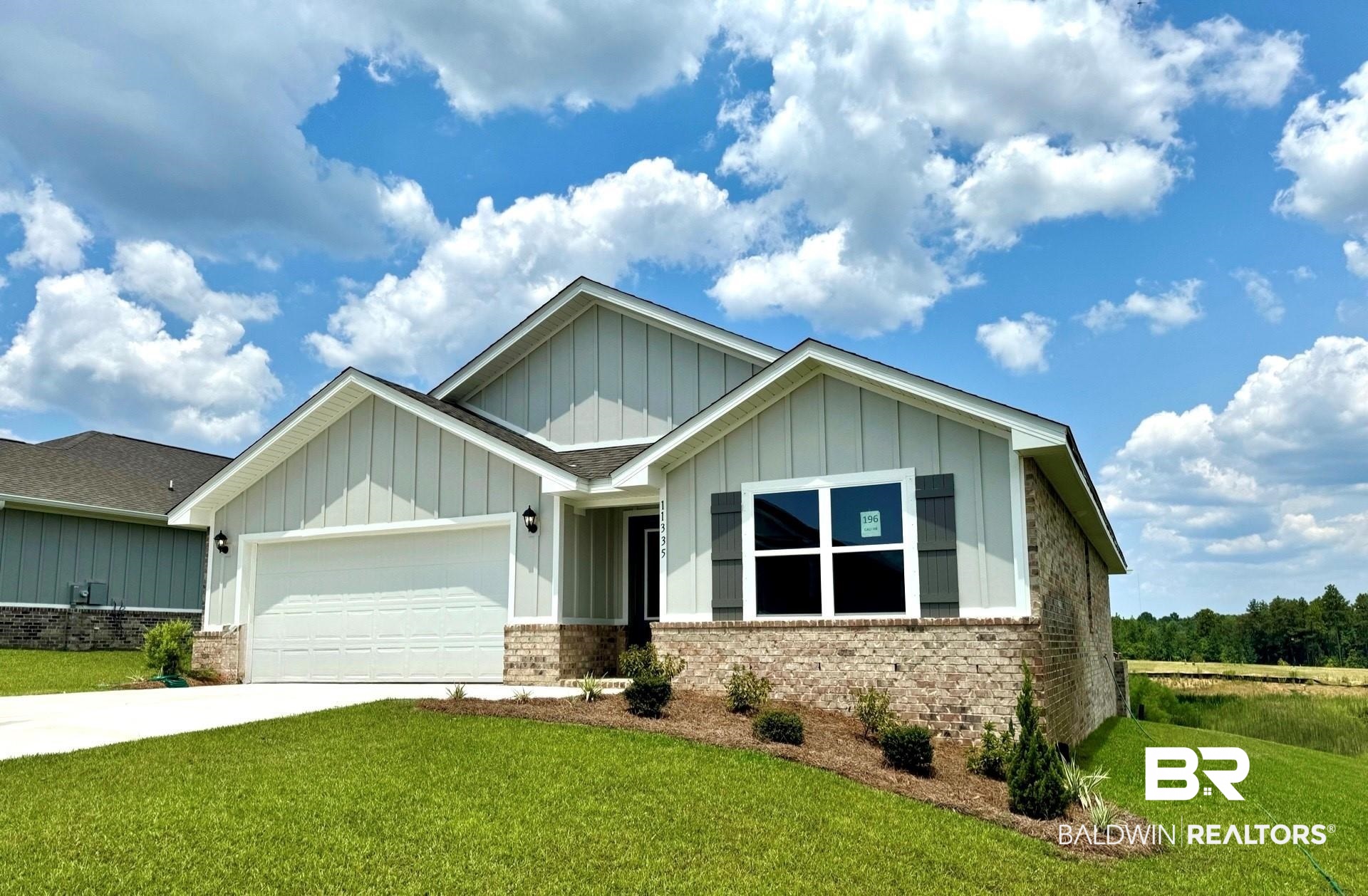 11335 Elemis Drive Daphne, AL 36526 - Photo 2 of 11 Craftsman house with a garage and a front yard