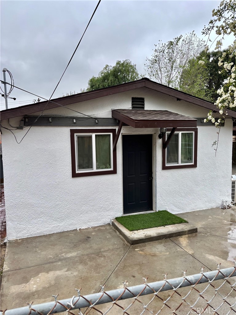 29040 Sheridan Road Castaic, CA 91384 - Photo 1 of 1 a front view of a house with a yard and garage