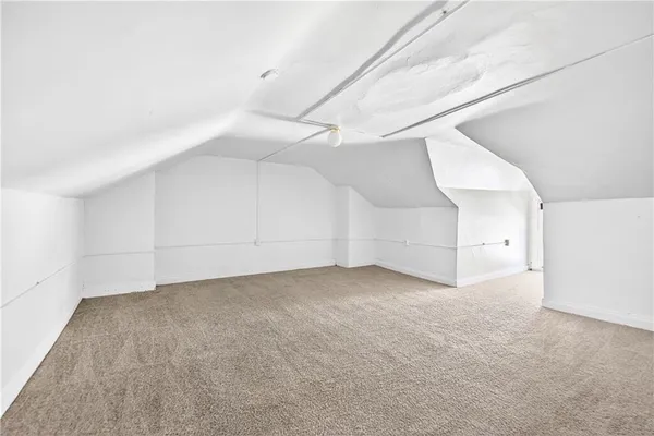 en empty room with white walls and white walls
