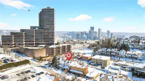 a city view with tall buildings