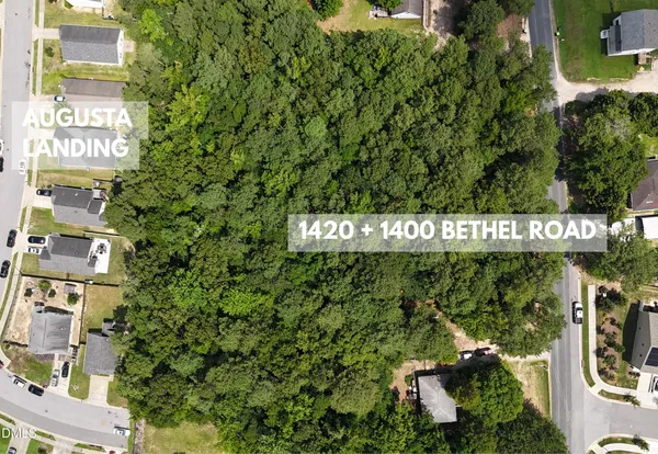 a street sign on a pole on a street