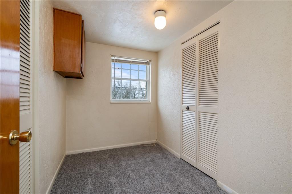 3504 Bevan Road North Versailles, PA 15137 - Photo 12 of 21 an empty room with windows and closet