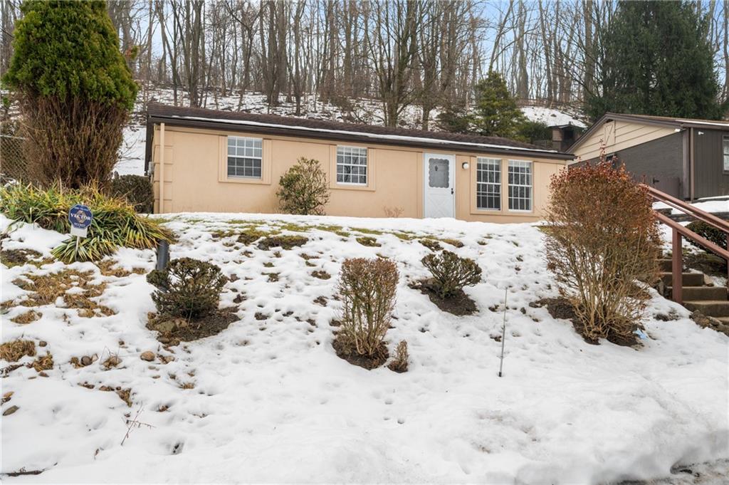 3504 Bevan Road North Versailles, PA 15137 - Photo 21 of 21 a view of a yard covered in snow