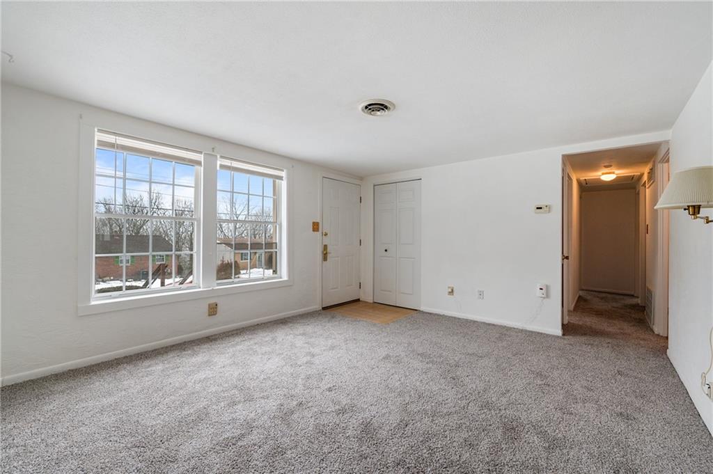 3504 Bevan Road North Versailles, PA 15137 - Photo 4 of 21 an empty room with a empty space and windows