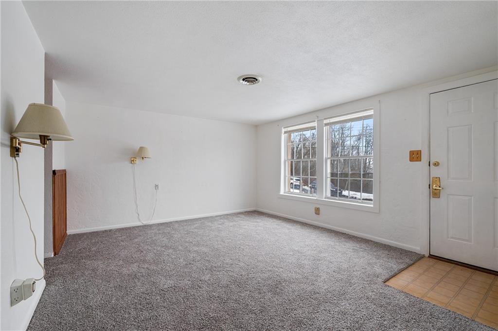 3504 Bevan Road North Versailles, PA 15137 - Photo 5 of 21 a view of an empty room with a window