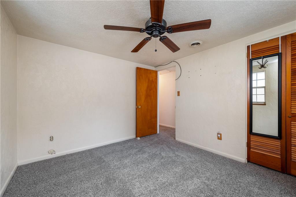 3504 Bevan Road North Versailles, PA 15137 - Photo 9 of 21 a view of a livingroom with a ceiling fan and window