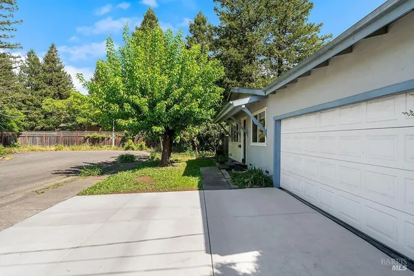 a view of a back yard of the house