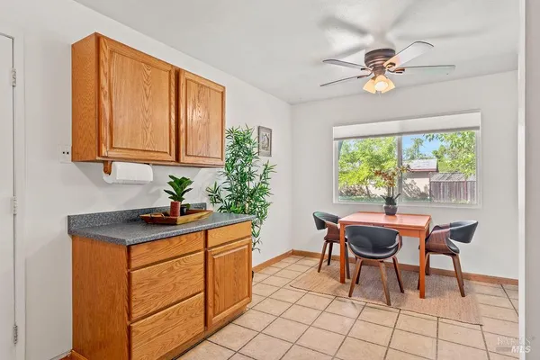 a kitchen with a cabinets and outdoor view