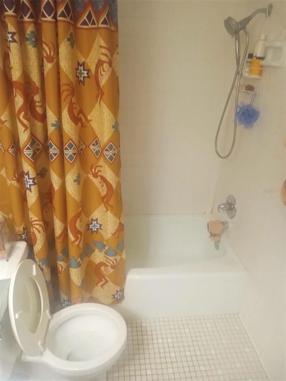 528 Lantern Circle Temple Terrace, FL 33617 - Photo 11 of 27 a bathroom with a toilet and shower