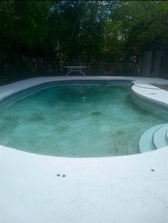 528 Lantern Circle Temple Terrace, FL 33617 - Photo 22 of 27 a view of swimming pool from a outdoor space