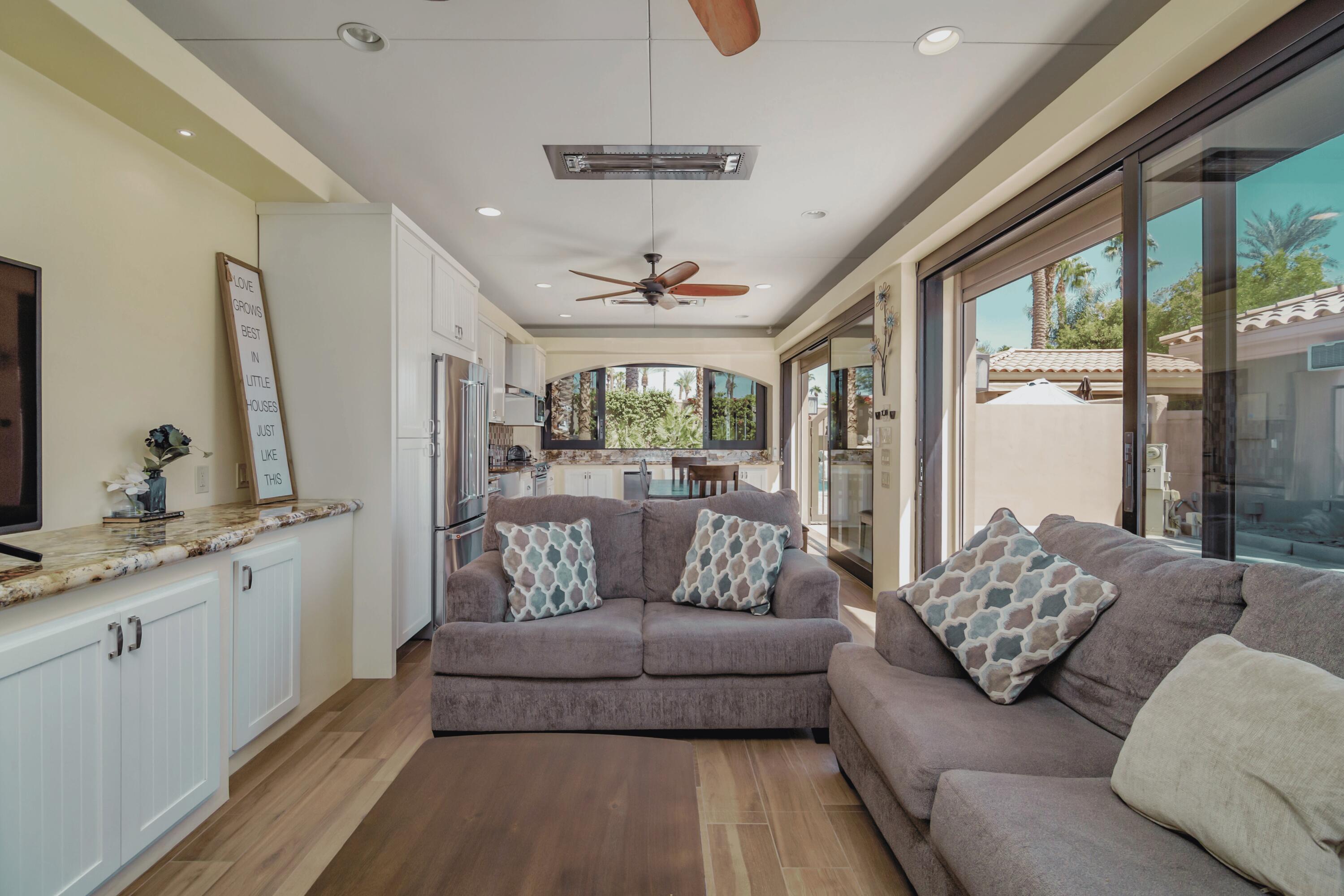 80501 Ave 48, Unit 21 Indio, CA 92201 - Photo 11 of 32 a living room with furniture and a large window