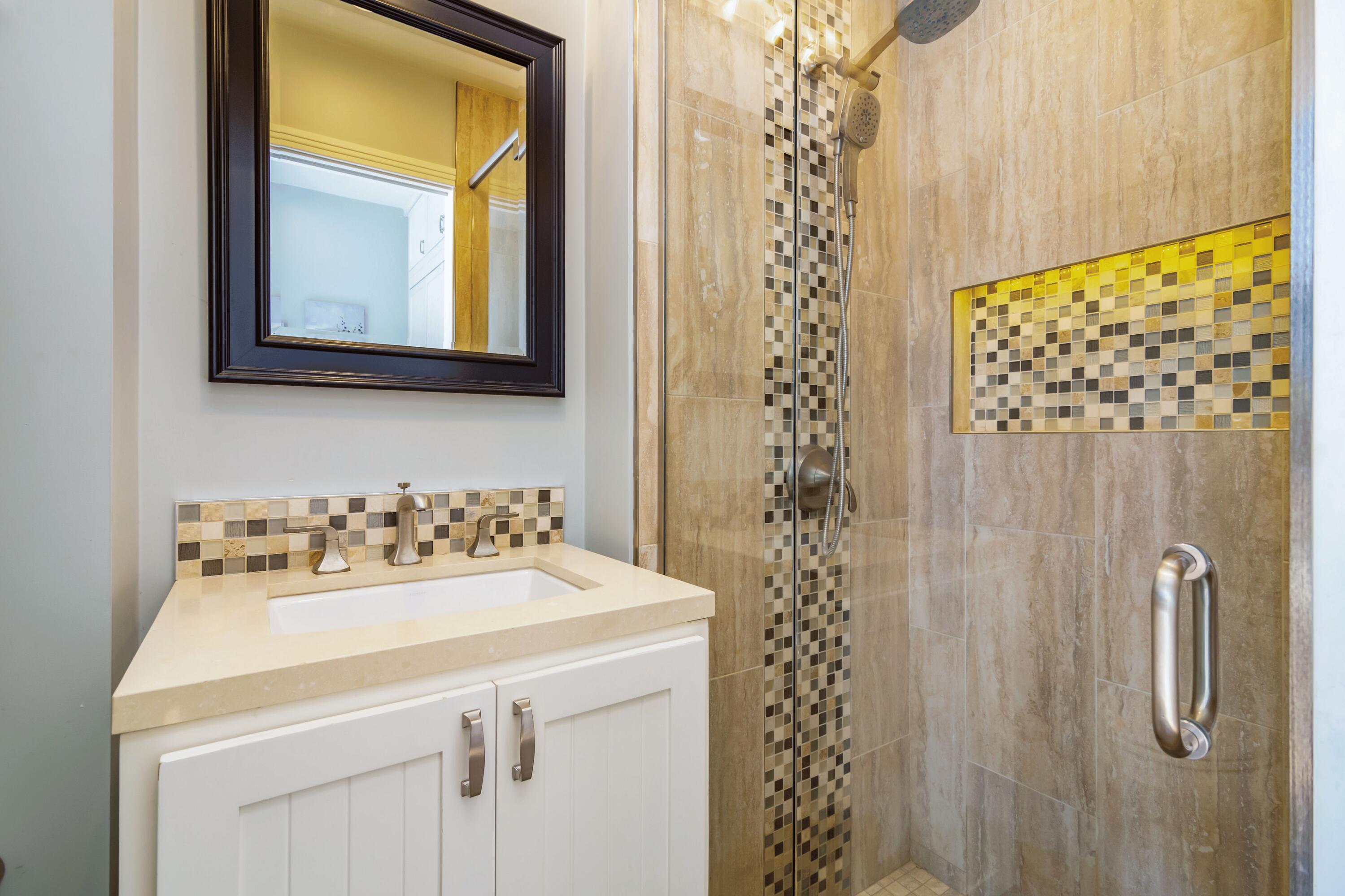 80501 Ave 48, Unit 21 Indio, CA 92201 - Photo 4 of 32 a bathroom with a sink vanity and a mirror