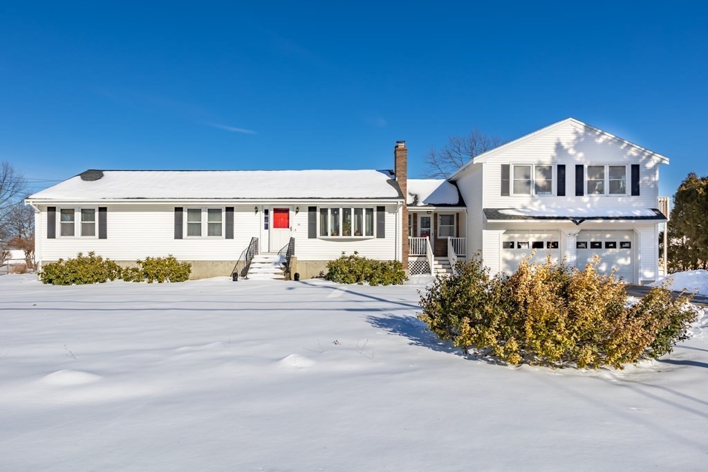 34 Wyman Road Billerica, MA 01821 - Photo 1 of 42 front view of a house with a street