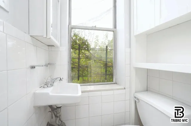 a bathroom with a sink and a toilet