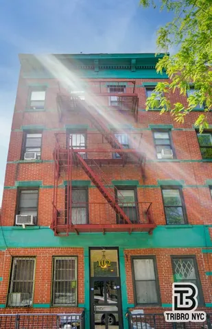 an aerial view of a house with a garden