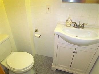 10 Moreland Street, Unit 2 Boston, MA 02119 - Photo 12 of 15 a bathroom with a sink and toilet