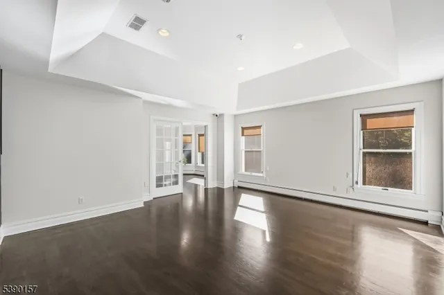 an empty room with windows