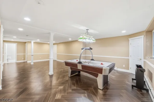 a media room with lots of chairs and a projector