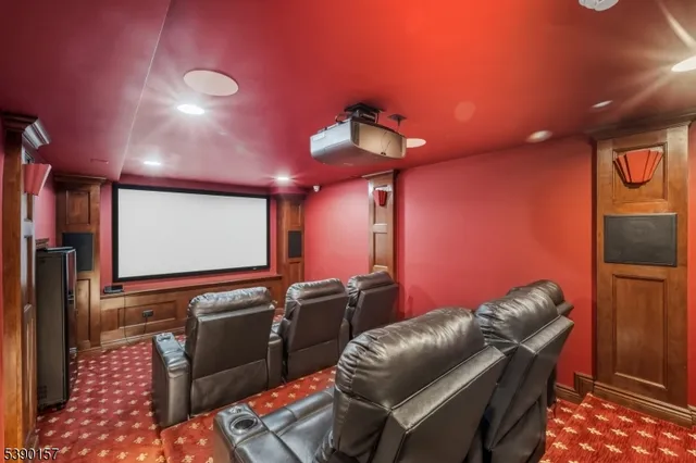 a bathroom with a sink mirror and toilet