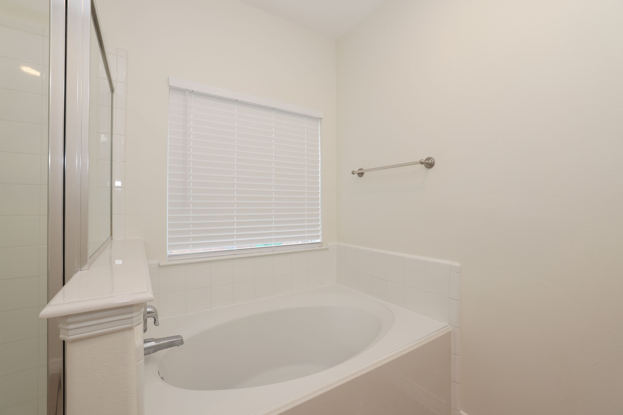 3031 Country Boy Court Spring, TX 77373 - Photo 19 of 35 a bathroom with a bathtub